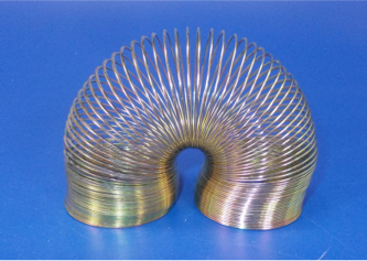 Helical Spring for Longitudinal Waves